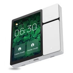 Wall-mounted 3.5-inch Tuya smart home panel with a green background and scenes displayed prominently