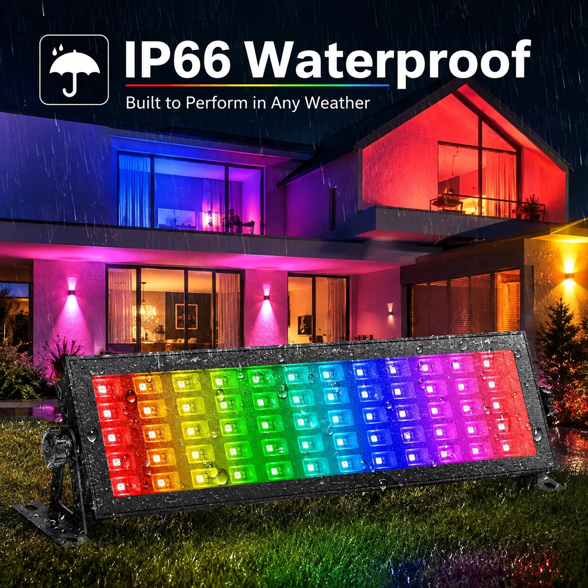 Barra LED RGB+CCT IP66 accesa sotto la pioggia sul prato davanti a una villa illuminata di colori